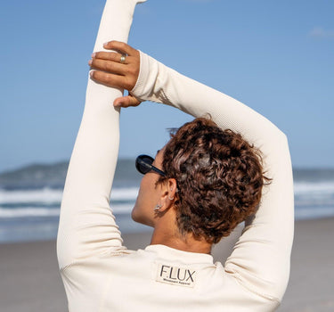 Luxurious long-sleeve Amy Ribbed Shrug designed for optimal workout performance, crafted using eco-conscious Amni Soul yarn for a guilt-free fitness experience.
