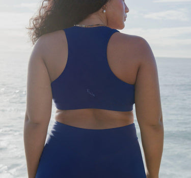 Versatile Indigo Blue Liv Sports Bra, Ideal for Workouts to Daily Wear, with a Supportive T-Back for Optimal Movement.