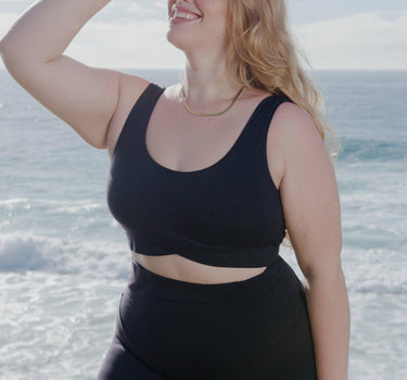 Eco-friendly Black Bruna Sports Bra in premium biodegradable fabric, blending chic style with environmental consciousness for Australian fitness enthusiasts.