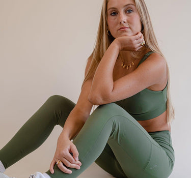 Olive Green High-Waist Leggings with deep pockets for practicality, blending eco-friendly fashion with ultimate workout efficiency.