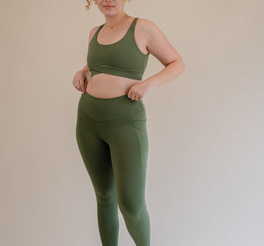 Stay-put Olive Green leggings with double-layer waistband, offering a smooth, flattering fit for active and casual wear.