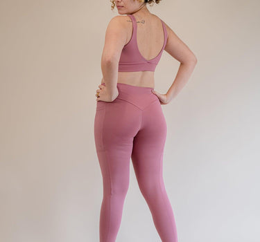 Vibrant Barbie pink Tina Leggings by F.lux, blending fashion-forward design with eco-warrior ethos, equipped with pockets for seamless functionality and style in activewear