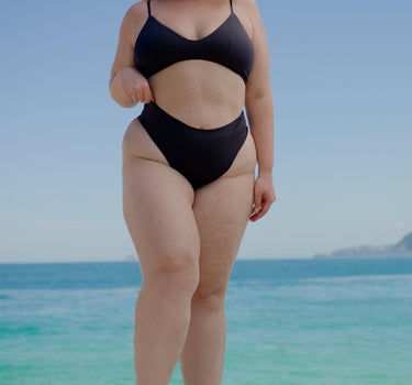 Sophisticated Black 90s High Waist Bikini Top, eco-friendly and perfect for Australian women who love classic swimwear style.